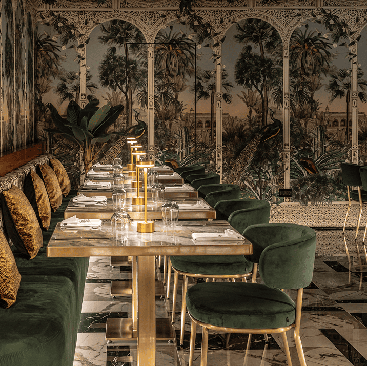 Emerald Room with green interiors and rustic decor at Ruby Rays Indian fusion restaurant in St. Julian’s, Malta